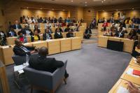 the audience listening to president masisi 