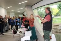 Holly Taylor Zuntz leading the speakers and participants in traditional Georgian polyphonic songs