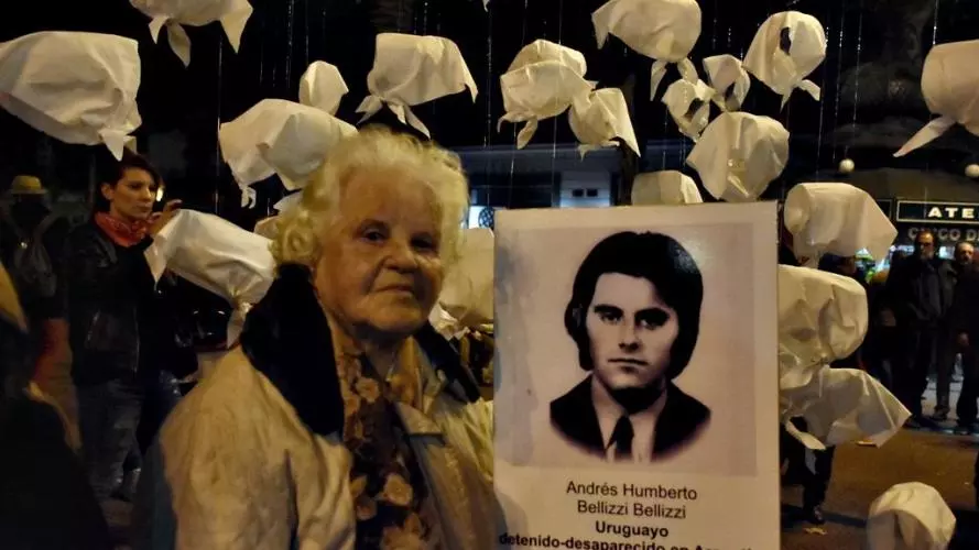 A Uruguayan mother holds a picture of a 'disappeared' victim. 